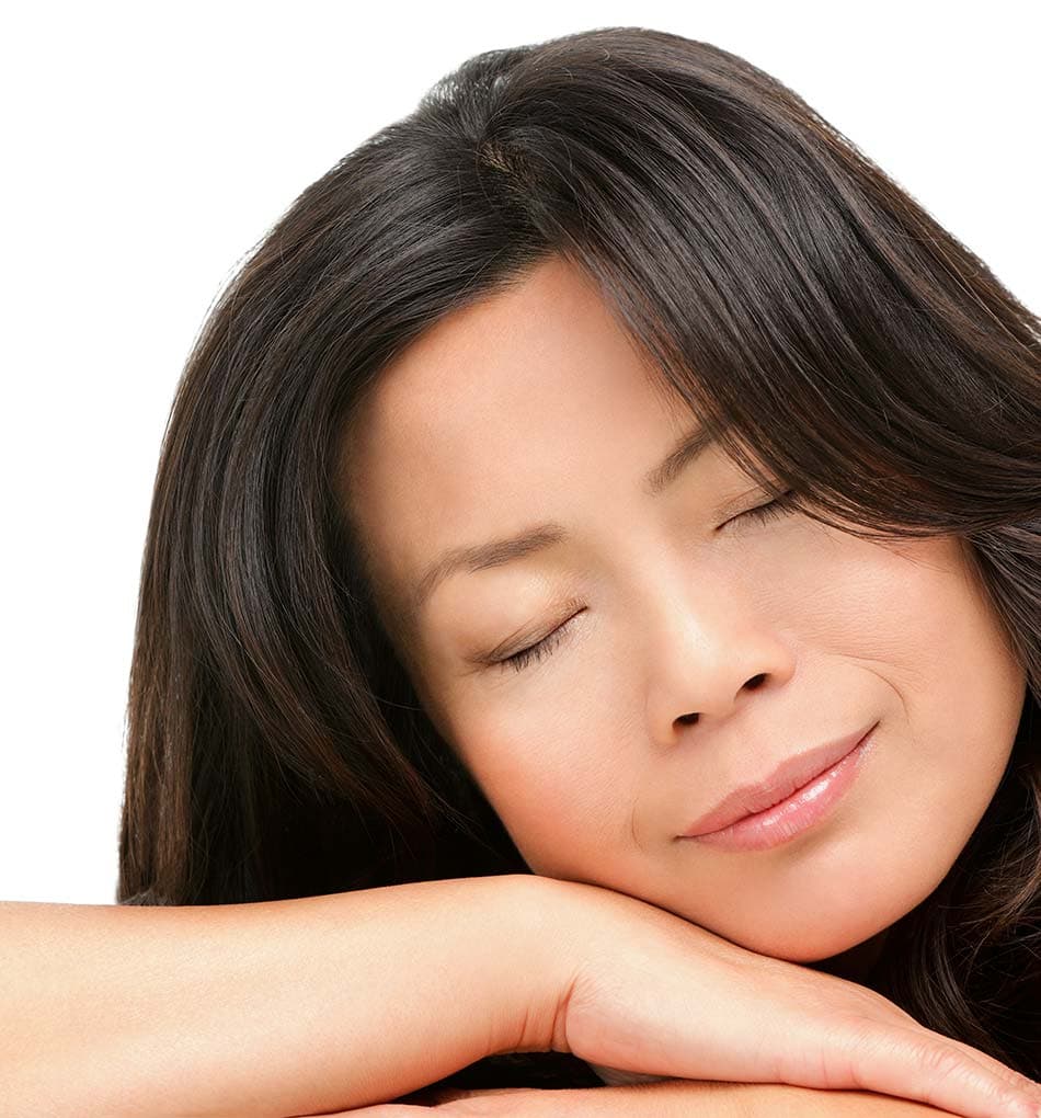 Patient relaxing comfortably during sedation dentistry procedure